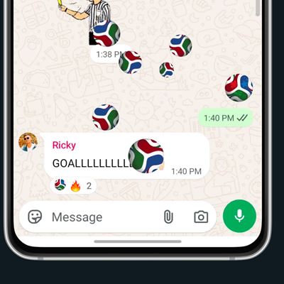 a soccer ball and a fire emoji. The WhatsApp message input field and microphone button are visible at the bottom.